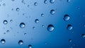 Clear water droplets on a smooth blue gradient background Royalty Free Stock Photo