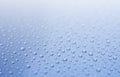 Clear water drops on gradient light blue background. Royalty Free Stock Photo