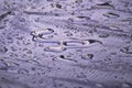 clear water drops on the striped white tarpaulin surface Royalty Free Stock Photo
