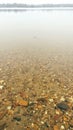 Clear Water at Lake with Rocky Bottom