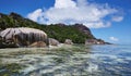 Clear water, mountains and palm trees, Seychelles Royalty Free Stock Photo