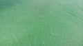 Clear water in the ocean. A blue, green, sea surface for background. View From above, flat lay. Aerial view, tropical beach, top v Royalty Free Stock Photo