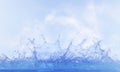 Clear water splashing against blue sky ,white day light cloud Royalty Free Stock Photo