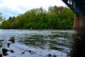 Red Cedar River under bridge in spring Royalty Free Stock Photo