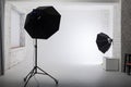 Clear white cyclorama. Light background with with professional lighting equipment. Plain wall empty photo studio. Royalty Free Stock Photo