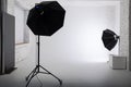 Clear white cyclorama. Light background with with professional lighting equipment. Plain wall empty photo studio. Royalty Free Stock Photo