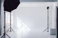 Clear white cyclorama. Light background with with professional lighting equipment. Plain wall empty photo studio. Royalty Free Stock Photo