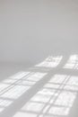Clear white cyclorama. Light background with sun light and shadows. Plain wall empty photo studio. Royalty Free Stock Photo
