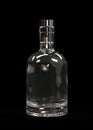 Glass Vodka, Gin, Liquor or Tequila Bottle Isolated on Black Background.