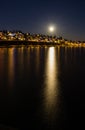 Full moon over White Rock reflects in Semiahmoo Bay, BC Royalty Free Stock Photo