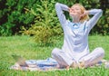 Clear your mind. Girl meditate on rug green grass meadow nature background. Find minute to relax. Woman relaxing