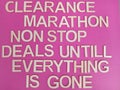 Clearance sale sign on a pink background Royalty Free Stock Photo