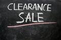 Clearance sale written on a blackboard