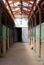 Cleared empty stall in the stable keeping sport horses Royalty Free Stock Photo