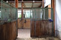 Cleared empty stall in the stable keeping sport horses Royalty Free Stock Photo