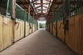 Cleared empty stall in the stable keeping sport horses Royalty Free Stock Photo