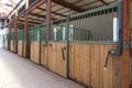 Cleared empty stall in the stable keeping sport horses Royalty Free Stock Photo