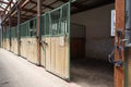 Cleared empty stall in the stable keeping sport horses Royalty Free Stock Photo