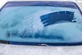 Cleared the frost on the windshield in the cold, front and rear blurring the background Royalty Free Stock Photo