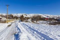 Cleared of snow secondary road from a countryside village Royalty Free Stock Photo