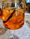 Clearglass with Aperol Spritz and ice cubes
