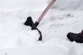 Clearing the garden and road after heavy snow Royalty Free Stock Photo