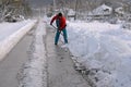 Clearing the road after a heavy snowfall