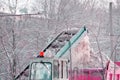 Clearing the road from snow scoop scraper Royalty Free Stock Photo