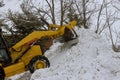 Clearing the road from snow tractor clears the way Royalty Free Stock Photo