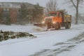 Clearing the road from snow tractor clears the way Royalty Free Stock Photo