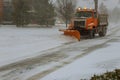 Clearing the road from snow street during snow blizzard Royalty Free Stock Photo