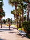 Clearwater Beach, Florida, USA 11/7/19 A woman running along the sidewalk on Mandalay Avenue