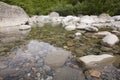 Clearwater stream over mixed rocks