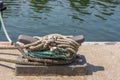 Cleat on the quay of a harbor facility