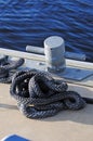 Cleat and rope on dock Royalty Free Stock Photo