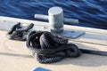 Cleat and rope on dock Royalty Free Stock Photo