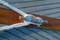 Cleat and rope on a sailboat Royalty Free Stock Photo