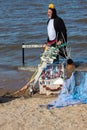 Climate change protestor on Cleethorpes beach