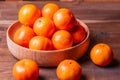 clementine mandarin fruit. mandarins in the wooden bowl Royalty Free Stock Photo