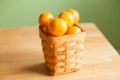 Clementine oranges in a basket Royalty Free Stock Photo