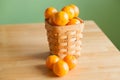Clementine oranges in a basket Royalty Free Stock Photo
