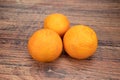 Clementines isolated on a wooden table