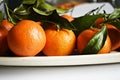 Clementines with leaves Royalty Free Stock Photo