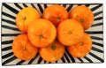 Clementines on a plate