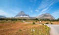 CLEMENTS MOUNTAIN TOWERING ABOVE HIDDEN LAKE HIKING TRAIL ON LOGAN PASS DURING 2017 FALL FIRES IN GLACIER NATIONAL PARK MONTANA US Royalty Free Stock Photo