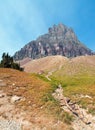 CLEMENTS MOUNTAIN TOWERING ABOVE HIDDEN LAKE HIKING TRAIL ON LOGAN PASS DURING 2017 FALL FIRES IN GLACIER NATIONAL PARK MONTANA US Royalty Free Stock Photo