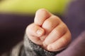 Clenched baby hand. Close up Royalty Free Stock Photo