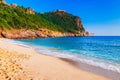 Cleopatra beach on sea coast with green rocks in Alanya peninsula, Antalya district, Turkey. Beautiful sunny landscape for tourism Royalty Free Stock Photo