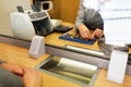 Clerk counting cash money at bank office Royalty Free Stock Photo