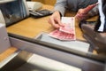 Clerk counting cash money at bank office Royalty Free Stock Photo